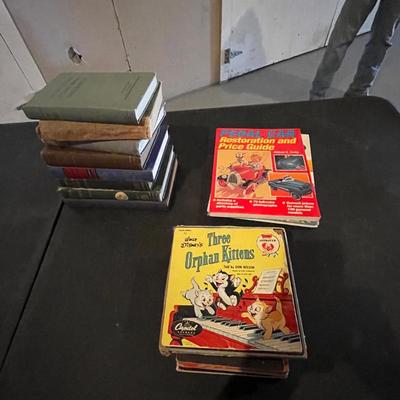 AN ASSORTMENT OF VINTAGE BOOKS