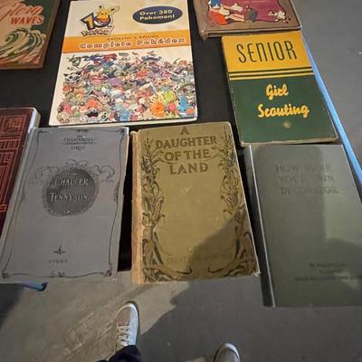 AN ASSORTMENT OF VINTAGE BOOKS