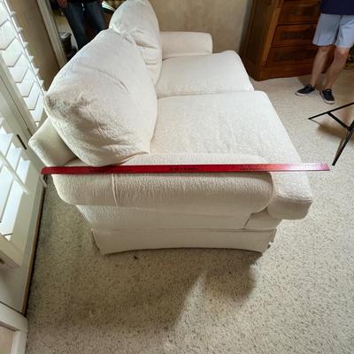 White overstuffed love seat