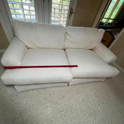 White overstuffed love seat