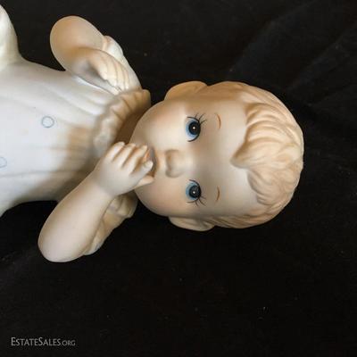 Lot 17- Seven Ceramic Baby Figurines 