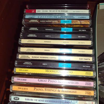 Collection of DVDs and CDs