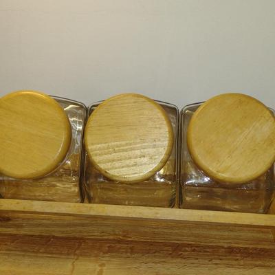 Trio of Glass Canisters with Wooden Lids and Holder