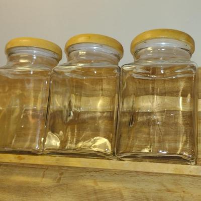 Trio of Glass Canisters with Wooden Lids and Holder