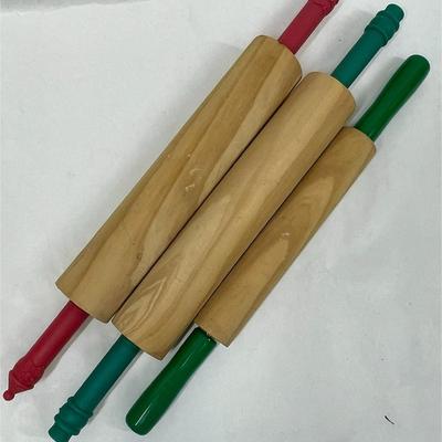 3 small wooden rolling pins with plastic handles