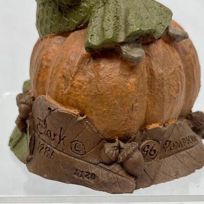 Figurine: Young Girl Seated next to Pumpkin