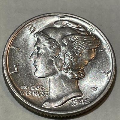 1942-P UNCIRCULATED CONDITION MERCURY SILVER DIME AS PICTURED.
