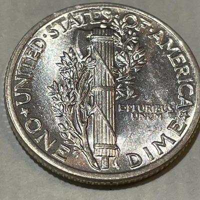 1941-P UNCIRCULATED CONDITION MERCURY SILVER DIME AS PICTURED.