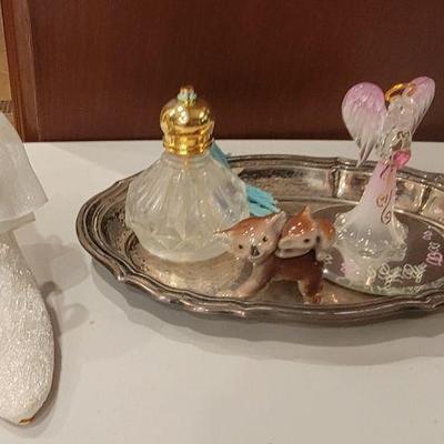 perfume bottle 
glass angel