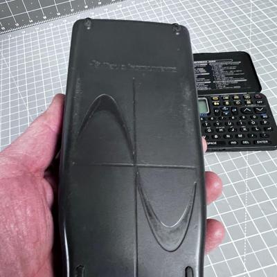 Texas Instrument TI 83 Graphic Calculator and Sharp Calculator