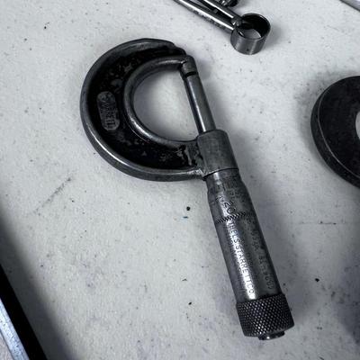 Precision Machinist Tools; Micrometer and a Caliper