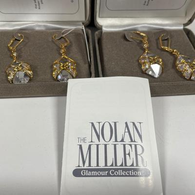 3 gold tone necklaces and 2 Nolan Miller earrings