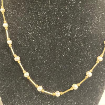 5 faux pearl necklaces