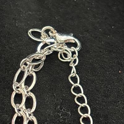 Silver tone chain necklace with broncos charm dangle