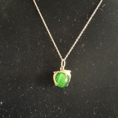 925 silver dolphin necklace with green glass or stone type pendant