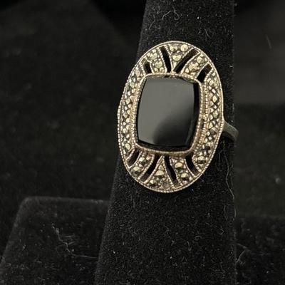 925 silver ring with black stone in middle