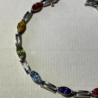 Vintage Sterling Silver Multi-Color Stone Tennis Bracelet 7.25" Long in Good Preowned Condition as Pictured.