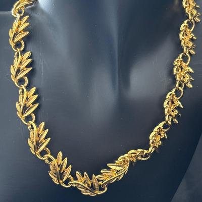Gold tone leaf bib necklace