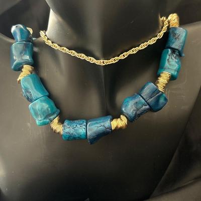 Silver tone necklace with blue chunky beads