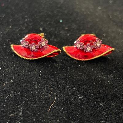 Gold tone red hat clip on earrings