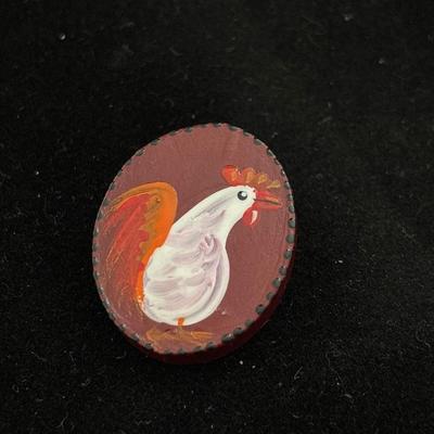 Peggy Anderson red chicken pin