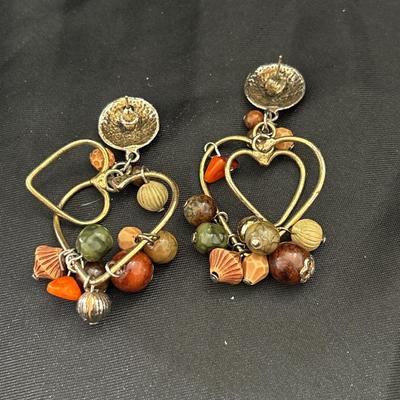 Gold tone heart beaded designs dangle earrings