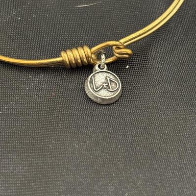 Gold tone L and D embrace the journey bracelet