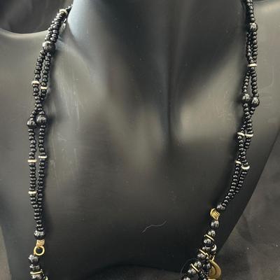 Gold toned and black beaded dangle statement necklace