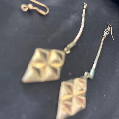 Gold tone dangle earrings