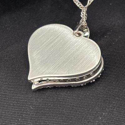 Silver tone heart pendant necklace