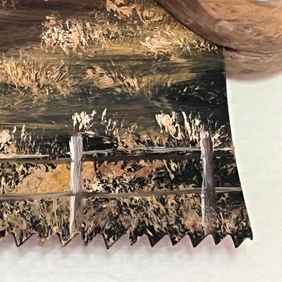 Painted saw art piece