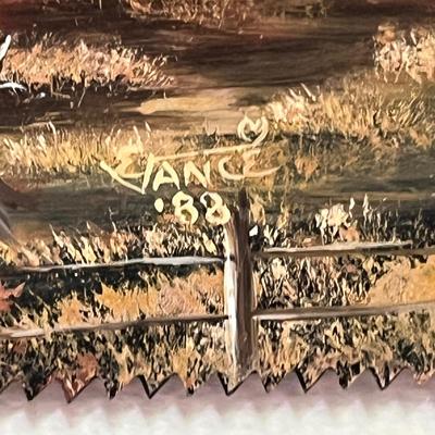 Painted saw art piece