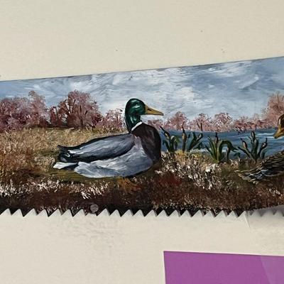 Painted saw art piece