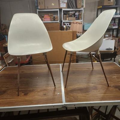 Pair of MCM molded plastic chairs