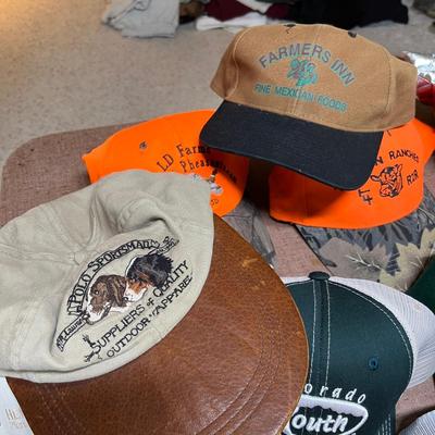 Large lot of snap back hats