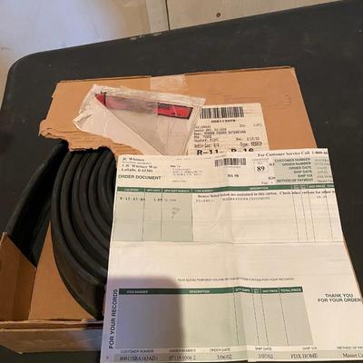 A ROLL OF RUBBER FENDER EXTENSIONS