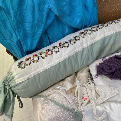 Blue storage locker full of vintage clothes, yardage