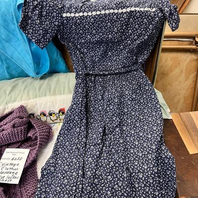 Blue storage locker full of vintage clothes, yardage