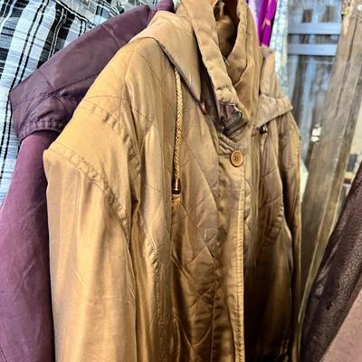 Rack of vintage clothing Crocheted sweater , Silk jackets