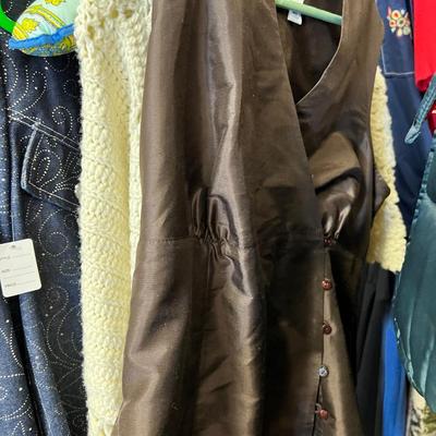Rack of vintage clothing Crocheted sweater , Silk jackets