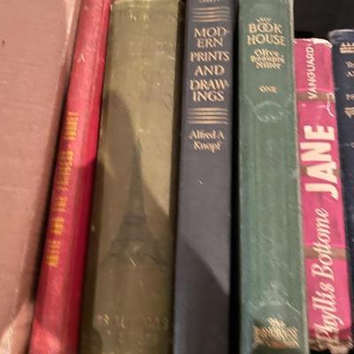 AN ASSORTMENT OF BOOKS