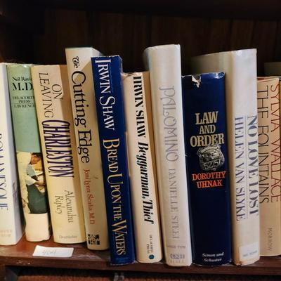 Two full shelves of Hardback Books