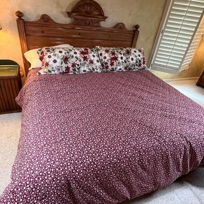 King Sized bed with awesome headboard