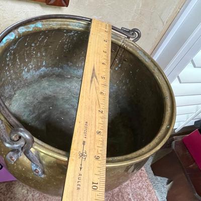 Candle & brass pot