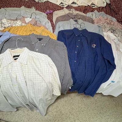 Large lot of men's dress shirts.