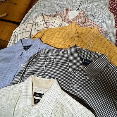 Large lot of men's dress shirts.