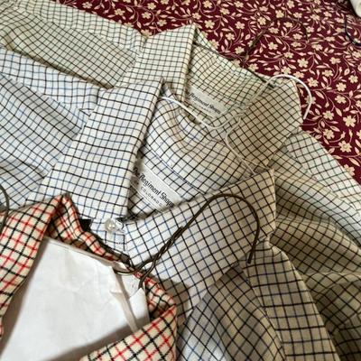 Large lot of men's dress shirts.