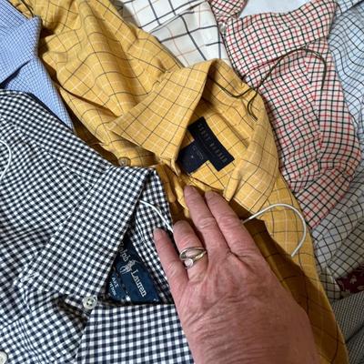 Large lot of men's dress shirts.