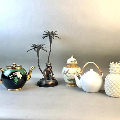 352 Various Teapots, Urn, Monkey and Palm Tree Candlesticks
