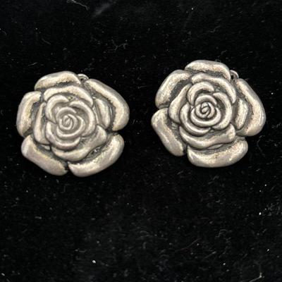 Silver toned rose clip on earrings